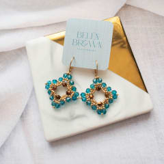 Aros Taylor esmeralda y dorado