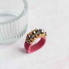 Anillo Corona granate y tornasol