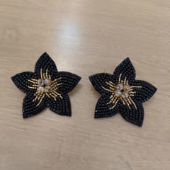 Aros Flor Grande Lily negro y dorado