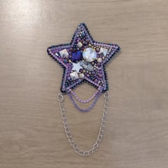 Prendedor estrella morada