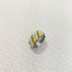 Anillo Ajustable Líneas Diagonal turquesa y naranjo