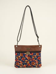 Cartera cuerina flores moradas