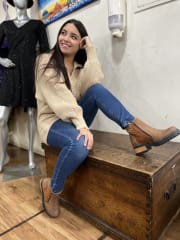 Suéter lana beige cuello camisero manga globo