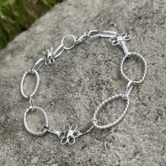 Pulsera plata 925 flor y ovalos entorchados