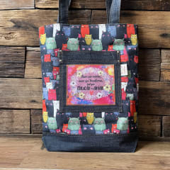 Tote Bag Educar es amar mundo de gatitos negros 0