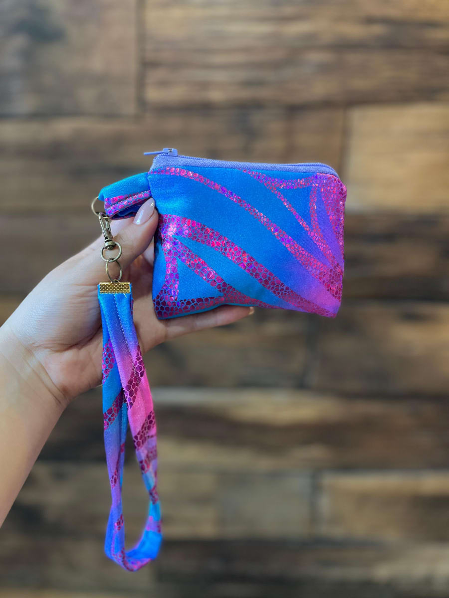 Monedero acolchado con cierre y asa  variedad de diseños y colores9