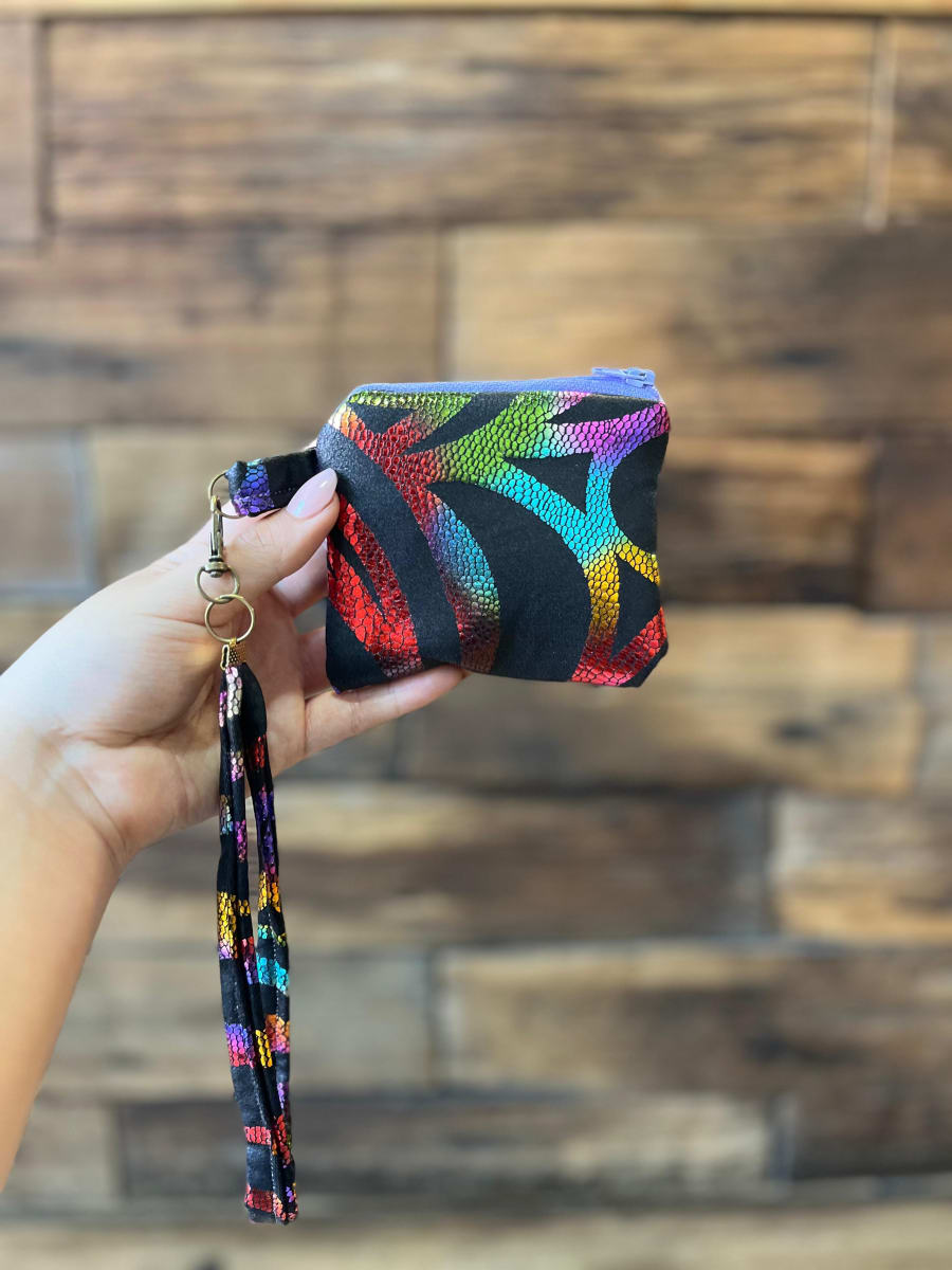 Monedero acolchado con cierre y asa  variedad de diseños y colores12