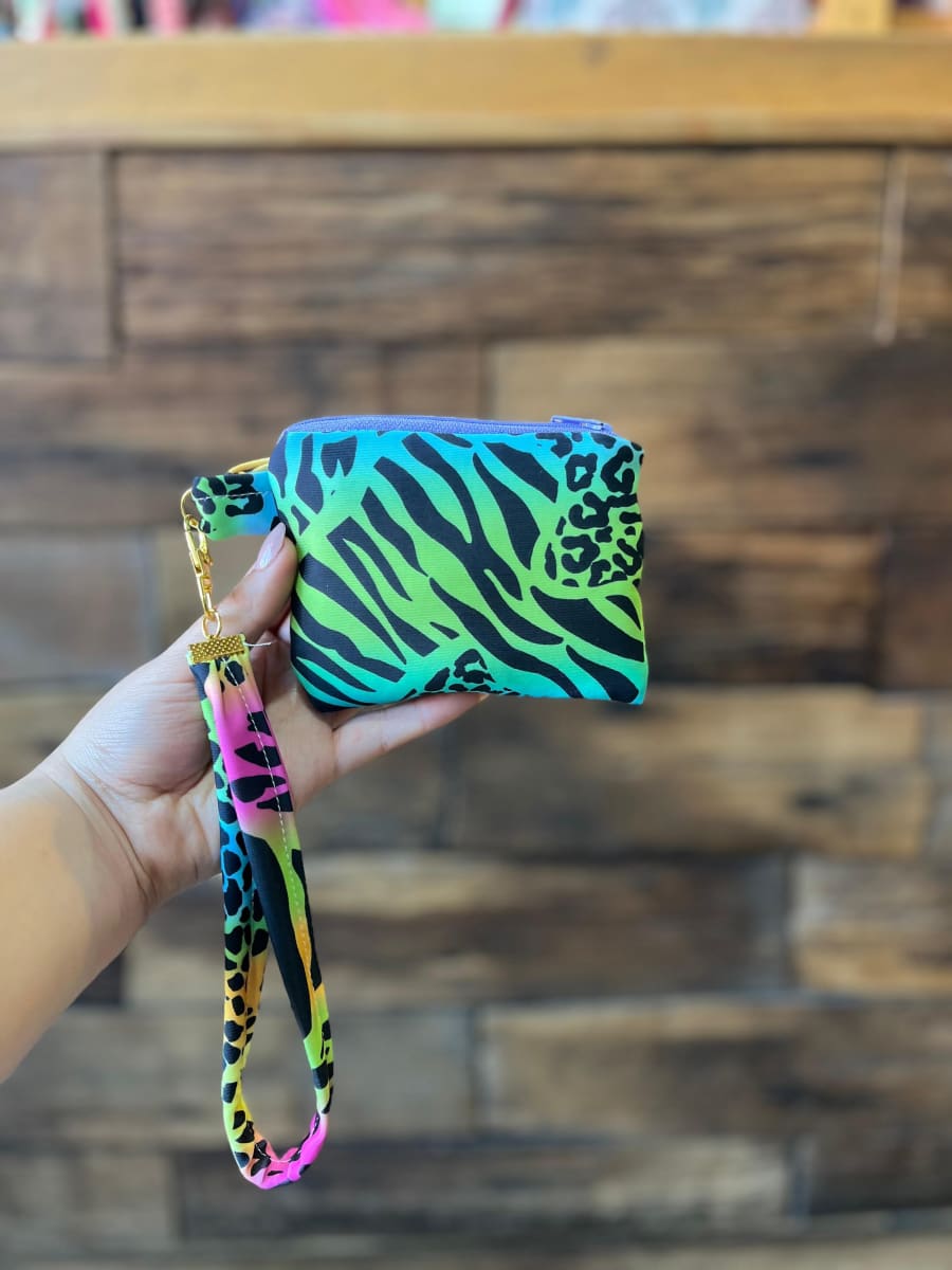 Monedero acolchado con cierre y asa  variedad de diseños y colores8