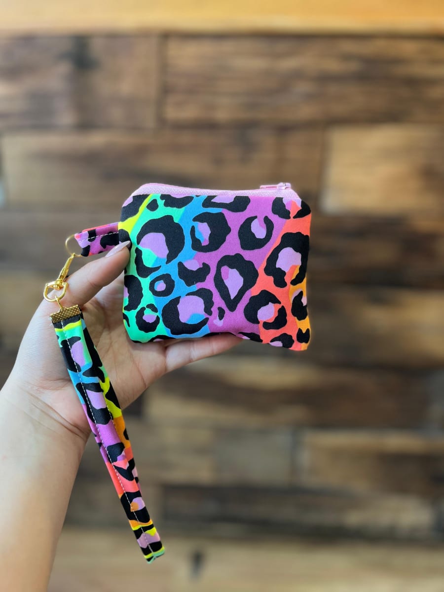 Monedero acolchado con cierre y asa  variedad de diseños y colores7