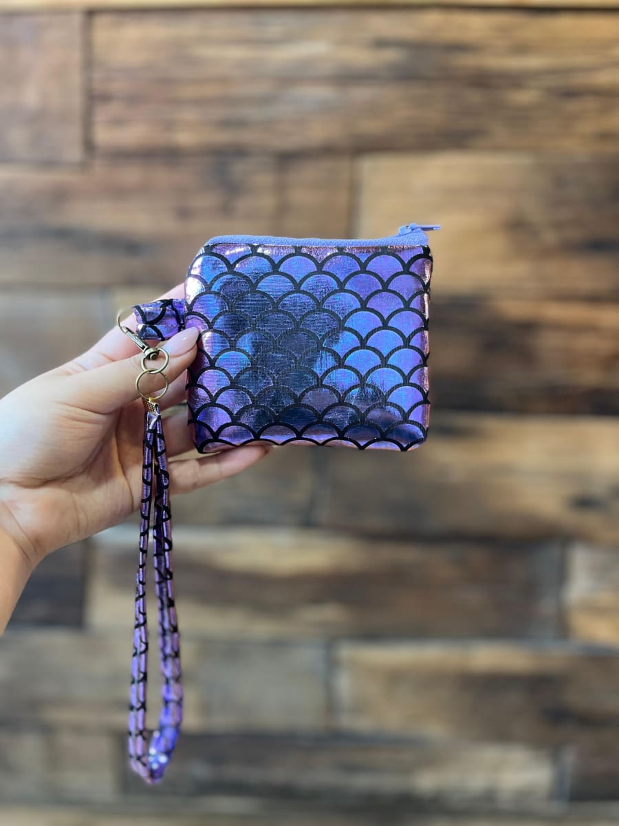 Monedero acolchado con cierre y asa  variedad de diseños y colores4