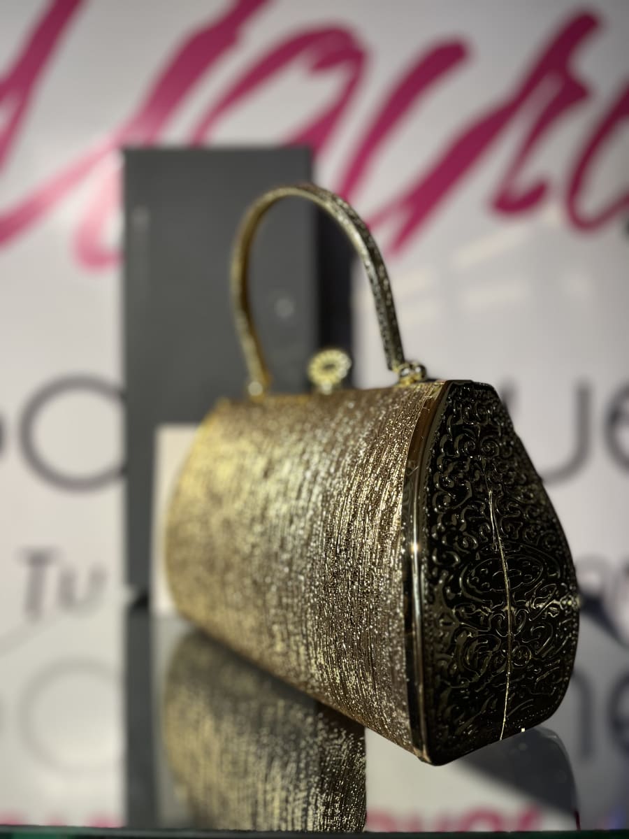 Cartera fiesta  dorada flor lineas con tomador1