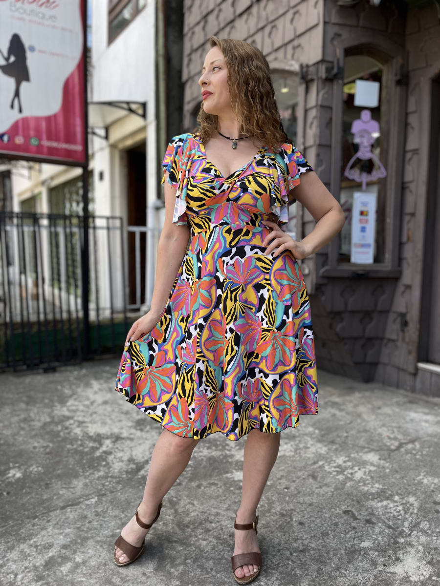 Vestido lycra escote cruzado print amarillo multicolor manga vuelito1