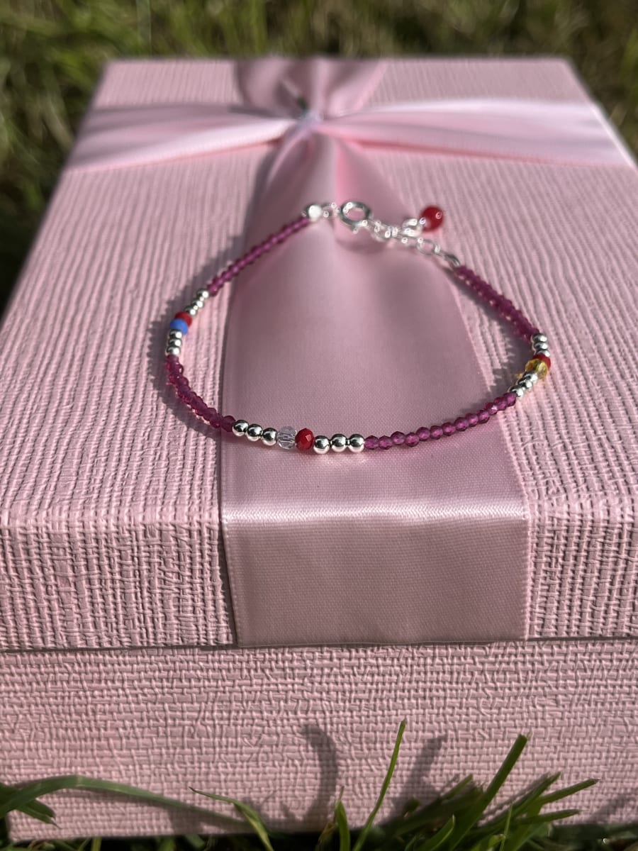 Pulsera plata 925 cristales magenta y rojo1