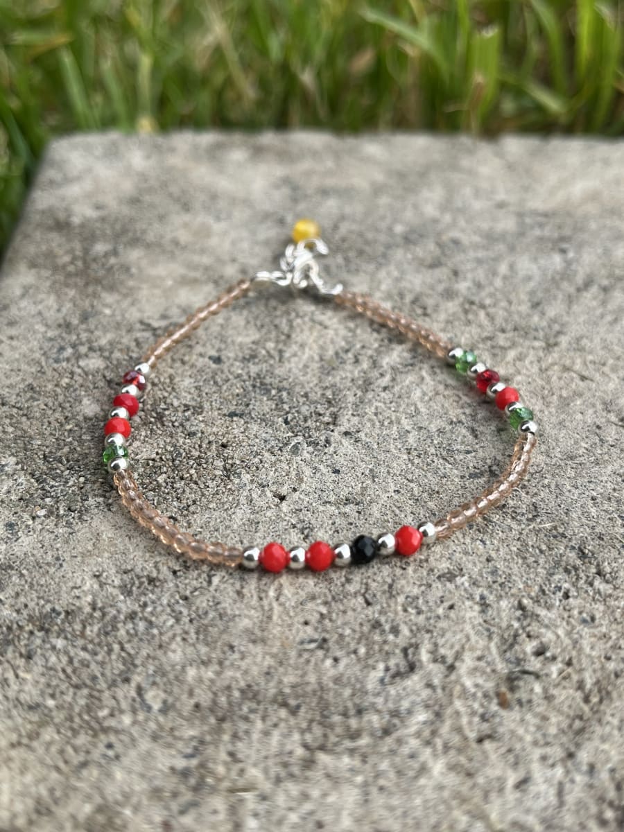 Pulsera plata 925 cristales naranjo y rojo1