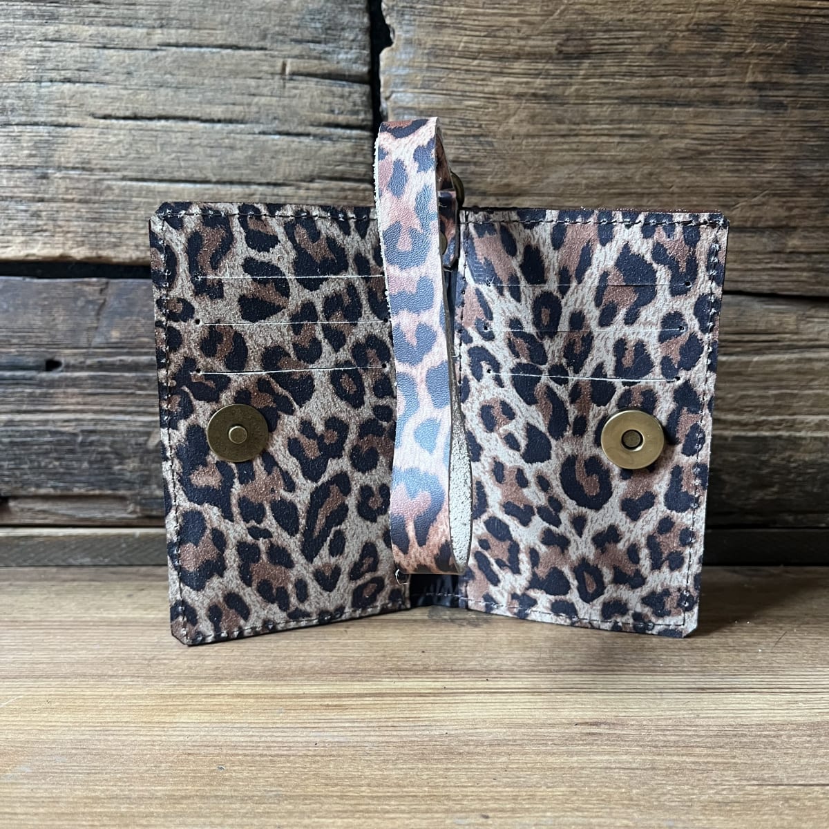 Billetera cuero corazon alado fucsia leopardo 2 cuerpos2