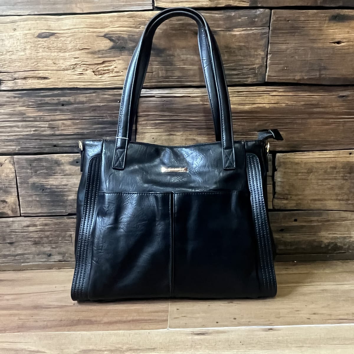 Cartera Lilás hombro negro con asa desmontable1