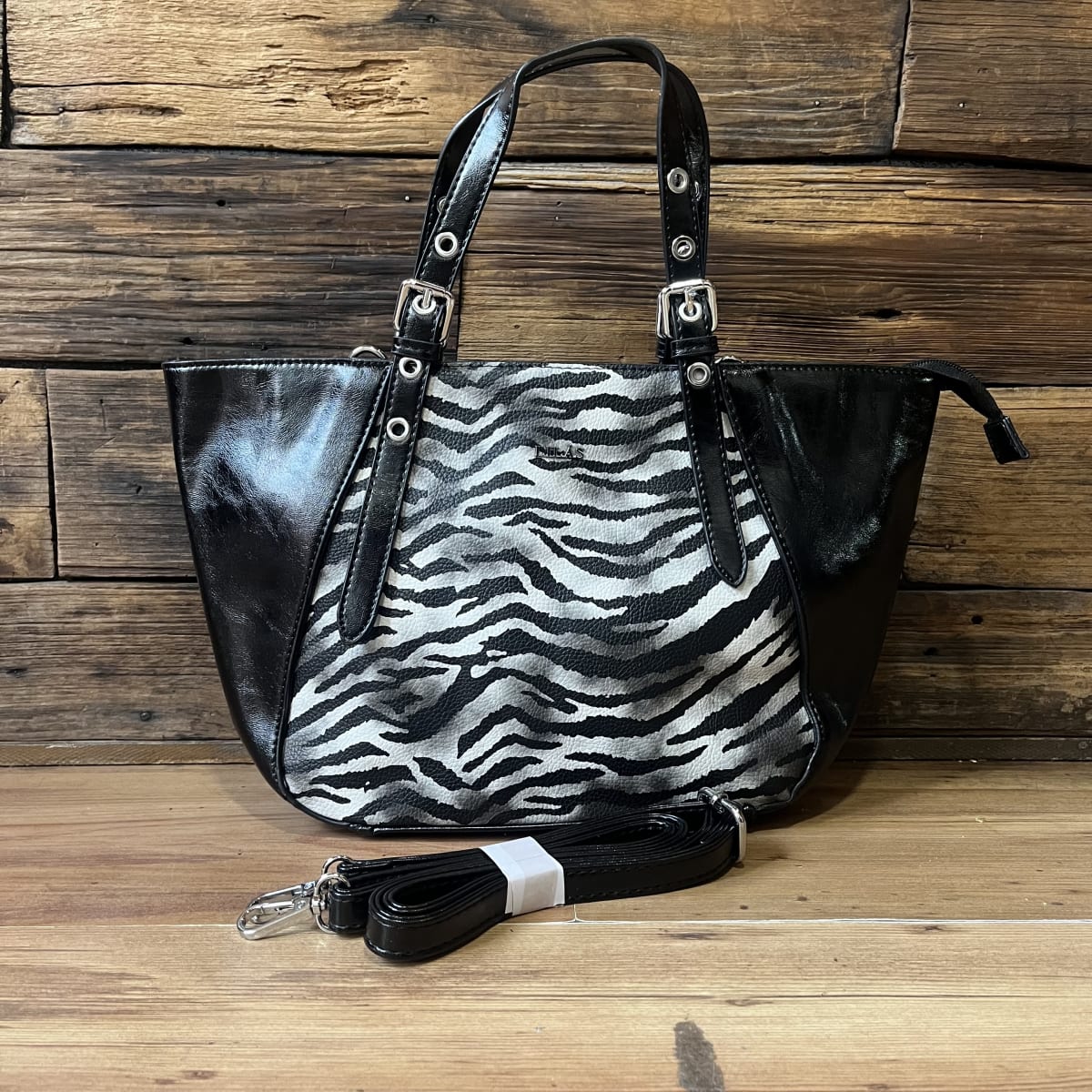 Cartera Lilás hombro negro cebra con asa desmontable1