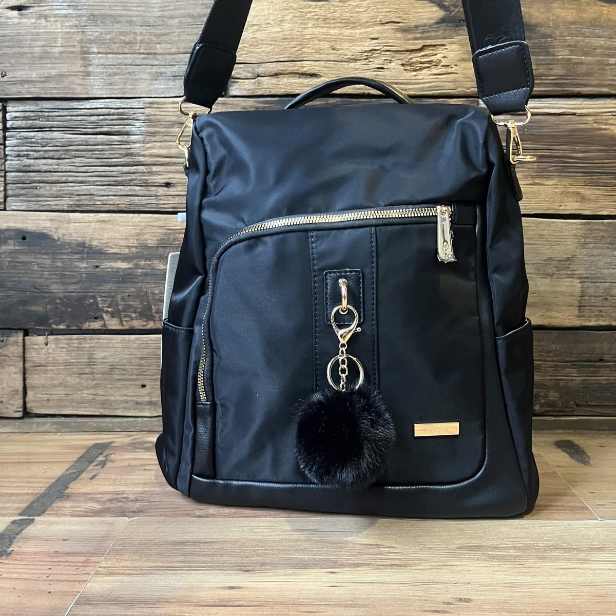 Mochila Lilás antirrobo negro llavero1
