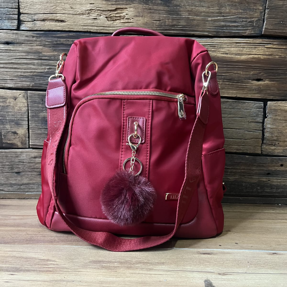 Mochila Lilás antirrobo rojo llavero2