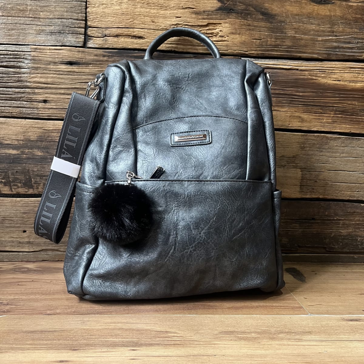 Mochila Lilás antirrobo marengo ecocuero y llavero1