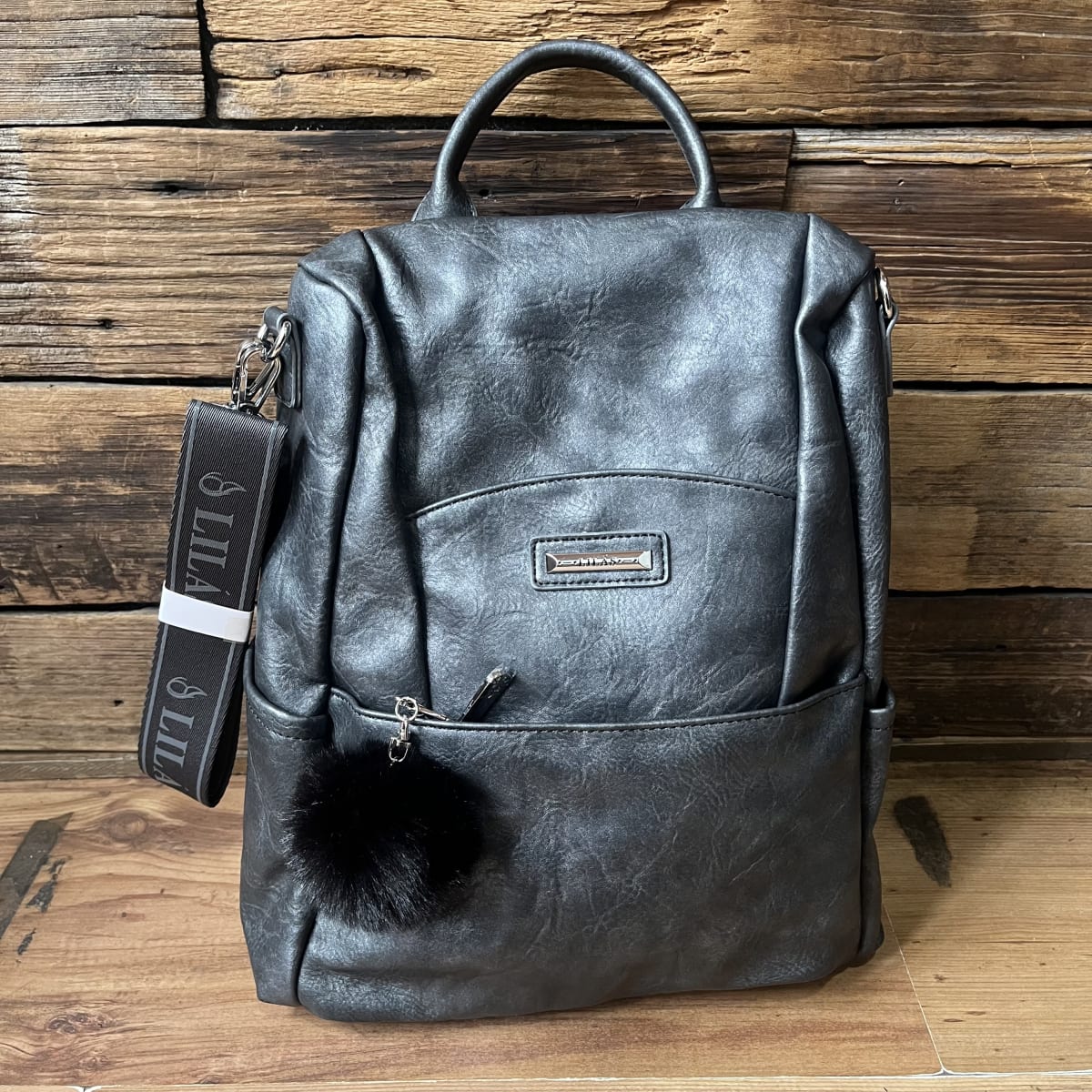 Mochila Lilás antirrobo marengo ecocuero y llavero2