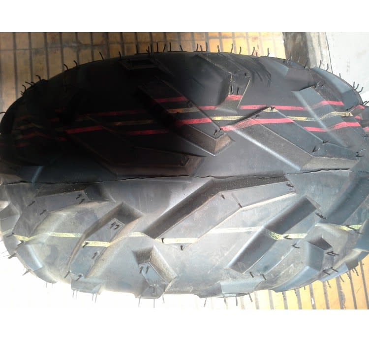 Neumático 10D AT22x10-10 39J 4PLY (255/60-10) sin llanta Duro1