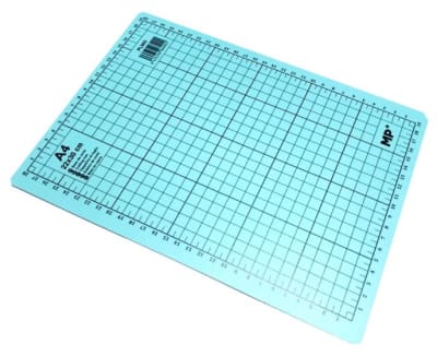 Base de Corte 22 x 30cms Cuadriculada (Unidad)1