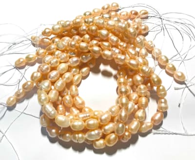 Perla Natural Arroz Peach 9x7mm (Tira)