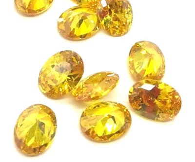 14x12mm Circón Topacio Gold Oval (Un)