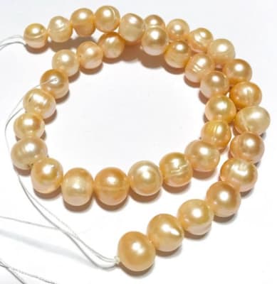 Perla Natural Potato Peach 10mm (Tira)1