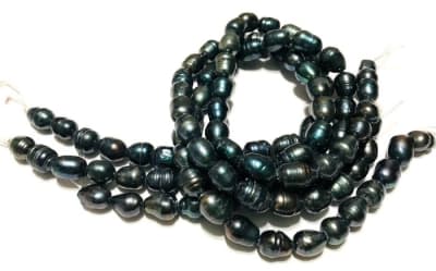 Perla Natural Arroz Petroleo 10x7mm (Tira)