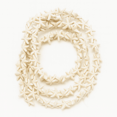 Estrella de Mar Cerámica Crema 15mm (Tira)