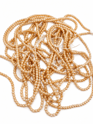 Perla Vidrio Mini Dorado Redonda 2mm (Tira)2