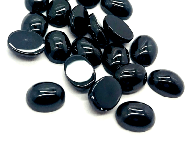 8x6mm Circón Negro Coubuchón Oval (Un)