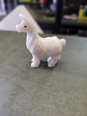 ADORNO LLAMA ETERNA – TALLADA EN PIEDRA NATURAL - REPRESENTA FUERZA, RESISTENCIA Y ESPÍRITU INCA1