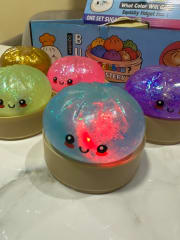 DUMPLING SQUISHY BRILLATES Y CON LUCES