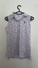 Polera Golf Mujer Sin Mangas Con Diseño Acuarela Blanco-Multi