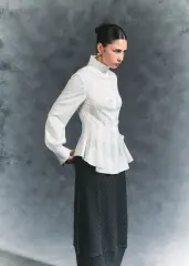 Blusa volante