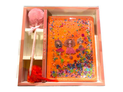 Cuaderno brillo con lápiz