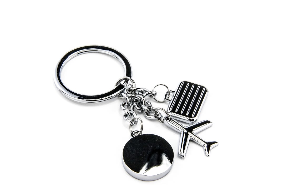 Llavero Troika diseño Viajero 3 dijes viaje, avión y maleta.3