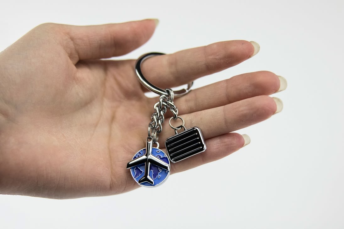 Llavero Troika diseño Viajero 3 dijes viaje, avión y maleta.5