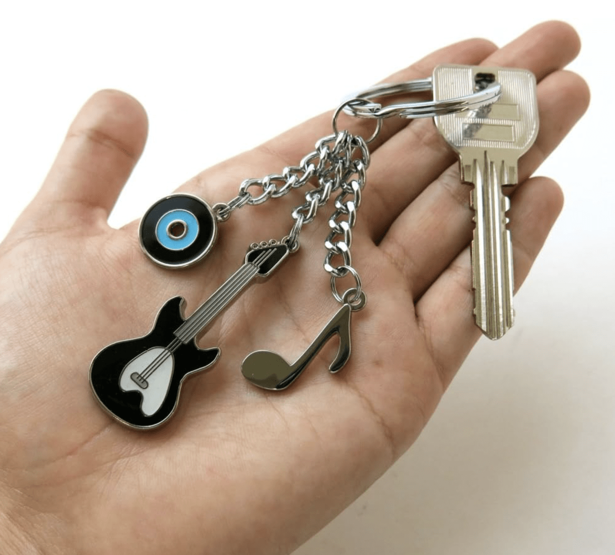 Llavero Troika Con 3 Dijes Musicales2