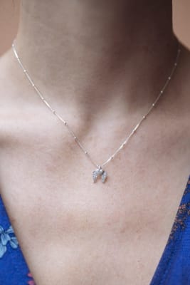 Collar corazon alado