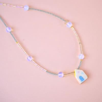 Collar casita tubo vidrio transparente piedra luna 011