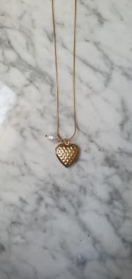 CADENA DE ACERO CORAZON DE LATON CHANEL PERLA DE RIO1