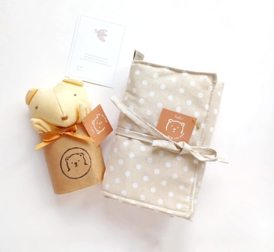 Pack Abrazo de Gracia / tutito amarillo-mudador beige puntos blancos