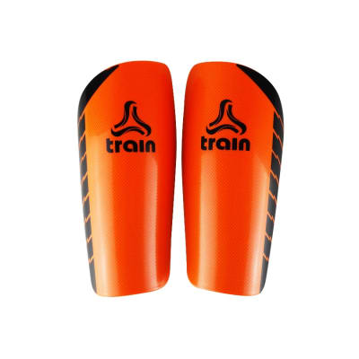 CANILLERA DE FUTBOL TRAIN PERFORMANCE COLOR NARANJA