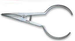 Pinza Porta Elásticos USA.