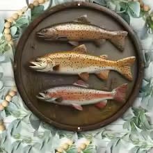 Letrero de lata con tres truchas redondo1