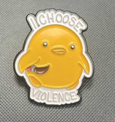 PIN POLLITO VIOLENCIA